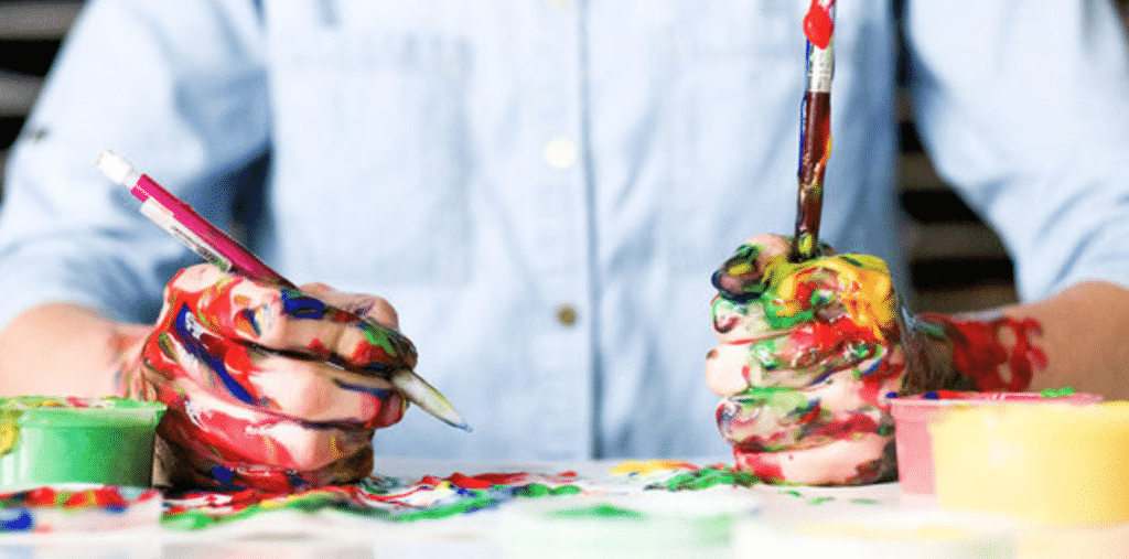 A child painting after following the Mastering Thinking Skills Bundle Ft. Timothy Kenny