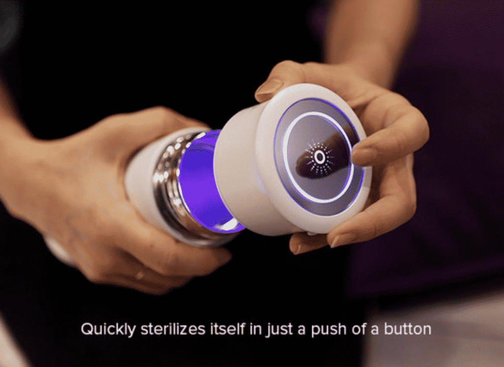 LINK UV Self-Cleaning Water Bottle with a women's hand
