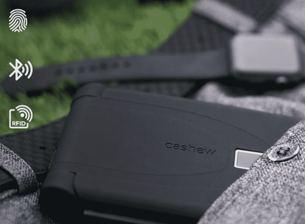 Cashew Smart Wallet with Fingerprint Access and Smartphone Connectivity inside a pocket