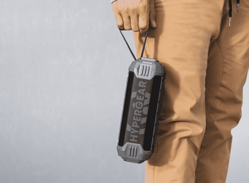 HyperGear Quake Wireless Speaker with Built-in Power Bank with a man holding it