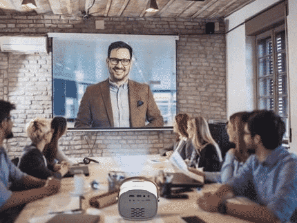 Minolta MN673 Mini LCD Projector in an office