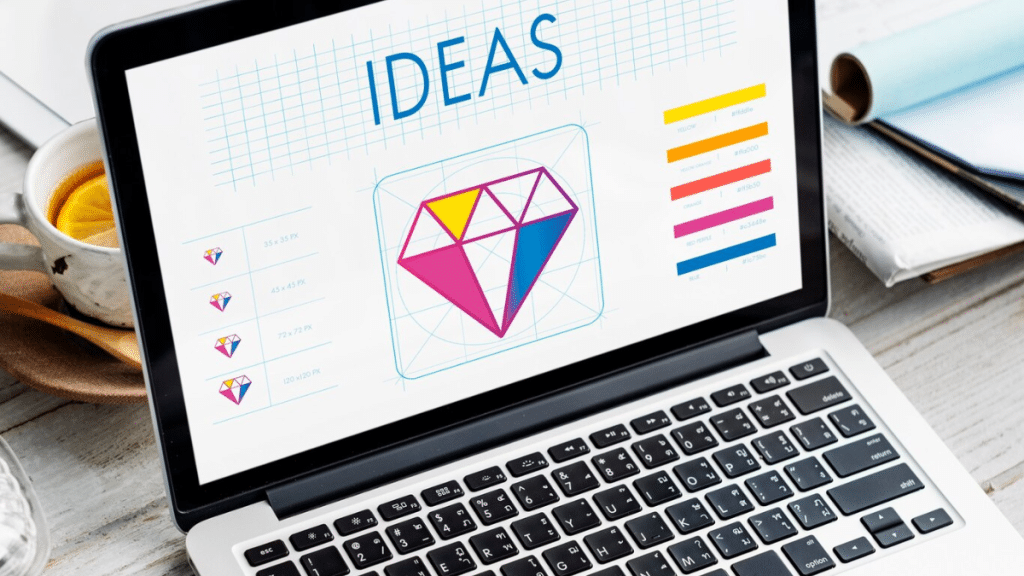 A laptop with Depositphotos homepage and credit card